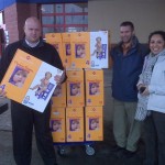 Team members from the Med Lab division purchase diapers for the  Lydia House.