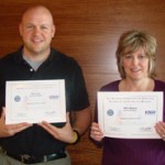 Matt Neel and Abby Hansen receive the Patriotic Employer Award.