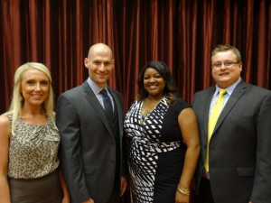 Aureus Medical employees Angela K. (far left), Rory A. (L), and Matt F. (R) with Rehab Therapy Employee of the Year, Tanesha K. 